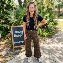 Load image into Gallery viewer, Leopard Print Ruffled Hem Shift Jeans
