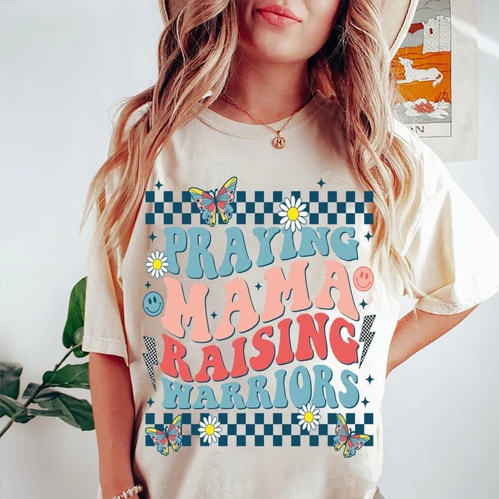 Praying mama raising warriors tee