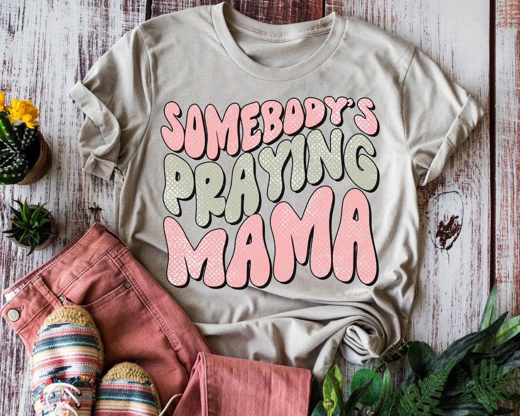 Somebody’s praying mama tee