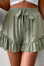 Load image into Gallery viewer, Green Textured Tie Waist Ruffle Hem Shorts
