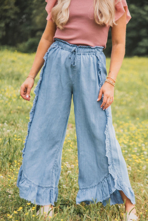 Magnolia Light Wash Raw Hem Ruffled Wide Leg Jeans